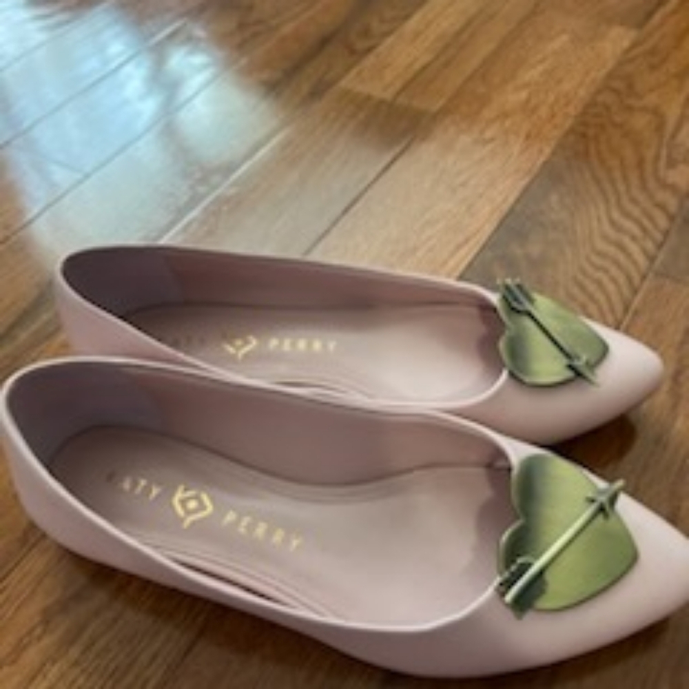 Pink rare Katy Perry flats with heart and arrow size 7.5